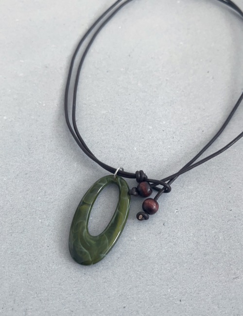 deep green hole leather necklace